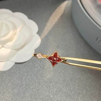 [LUXE] ANILLO ABIERTO ESTRELLA 1 DIAMANTE
