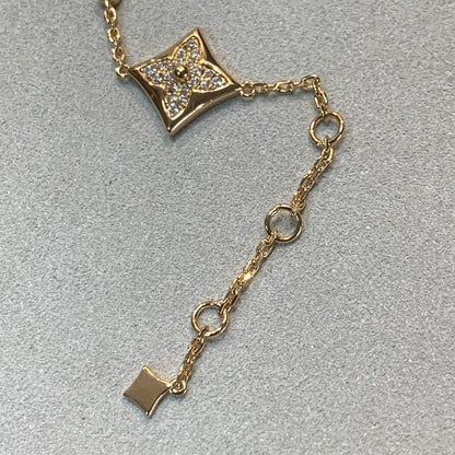 [LUXE] PULSERA DE ORO CON DIAMANTES Y ESTRELLA Y SOL, 4 MOTIVOS