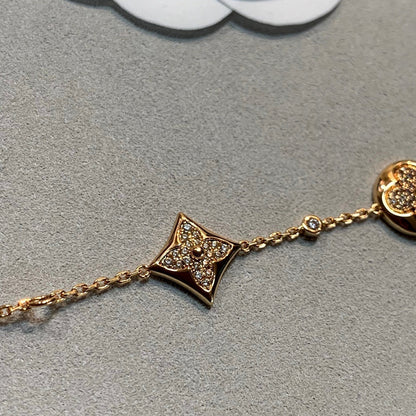 [LUXE] PULSERA DE ORO CON DIAMANTES Y ESTRELLA Y SOL, 4 MOTIVOS