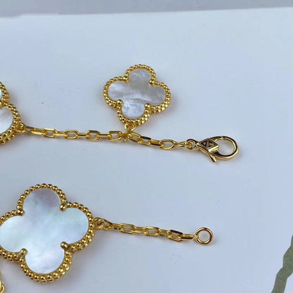 [LUXE] PULSERA DE ORO CON TRÉBOL MÁGICO Y 5 MOTIVOS
