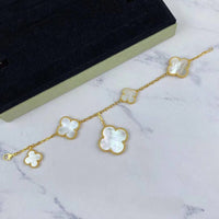[LUXE] PULSERA DE ORO CON TRÉBOL MÁGICO Y 5 MOTIVOS