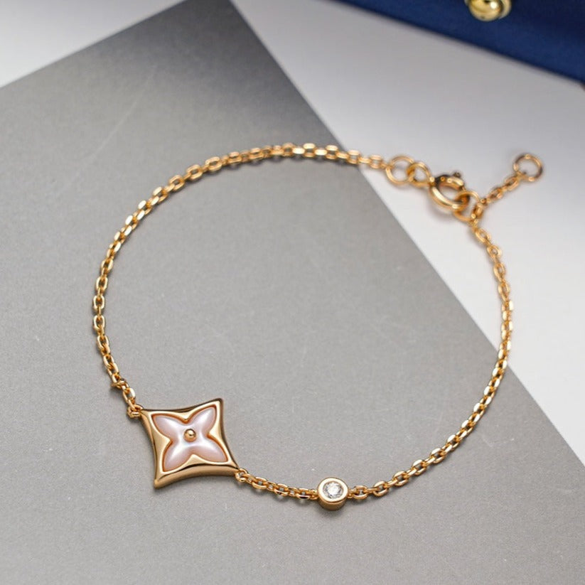 [LUXE] PULSERA DE ORO ROSA CON 1 DIAMANTE Y ESTRELLA