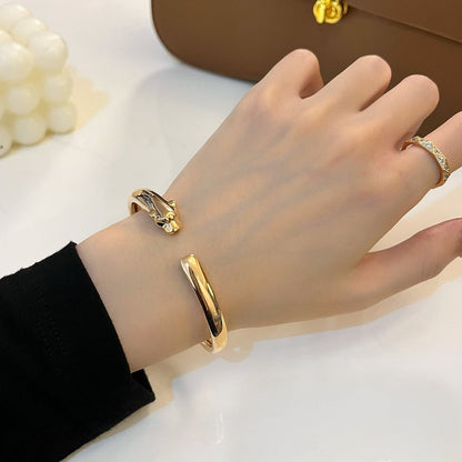 [LUXE]PULSERA ABIERTA DE ORO PANTHERE