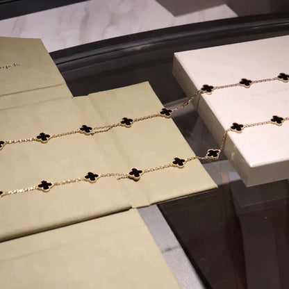 [LUXE] COLLAR DE ÓNIX CON 20 MOTIVOS DE TRÉBOL