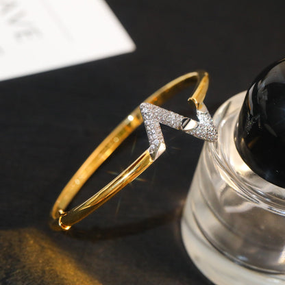 [LUXE] VOLTE PULSERA DE ORO CON DIAMANTES Y SITIO ABAJO
