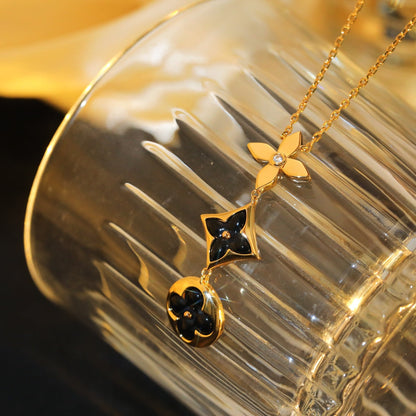 [LUXE] COLLAR DE ORO ROSA CON ÓNIX ESTRELLA Y SOL