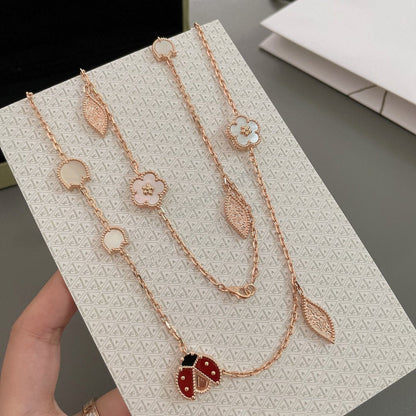 [LUXE] COLLAR DE ORO ROSA CON 15 MOTIVOS DE LA SUERTE PRIMAVERA