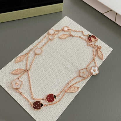 [LUXE] COLLAR DE ORO ROSA CON 15 MOTIVOS DE LA SUERTE PRIMAVERA