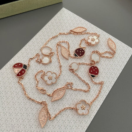 [LUXE] COLLAR DE ORO ROSA CON 15 MOTIVOS DE LA SUERTE PRIMAVERA
