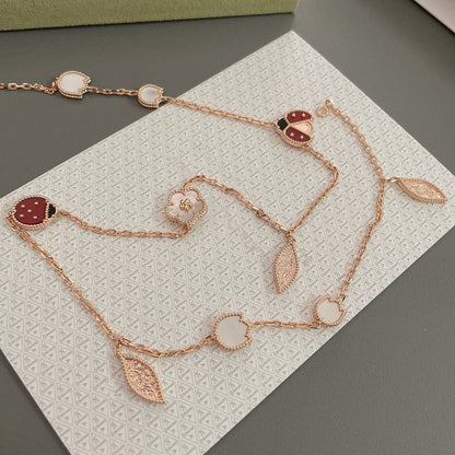 [LUXE] COLLAR DE ORO ROSA CON 15 MOTIVOS DE LA SUERTE PRIMAVERA