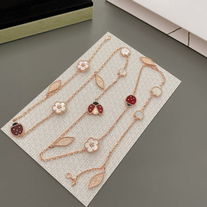 [LUXE] COLLAR DE ORO ROSA CON 15 MOTIVOS DE LA SUERTE PRIMAVERA