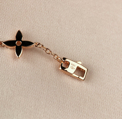 [LUXE]PULSERA DE ORO CON 7 MOTIVOS DE ESTRELLA Y SOL