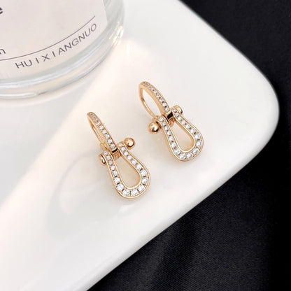 [LUXE] PENDIENTES GOTA FORCE 10 CON DIAMANTES, MODELO MEDIANO