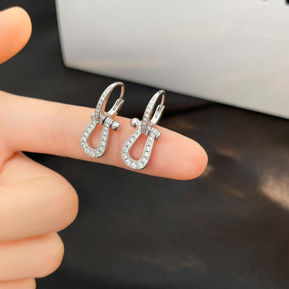 [LUXE] PENDIENTES GOTA FORCE 10 CON DIAMANTES, MODELO MEDIANO