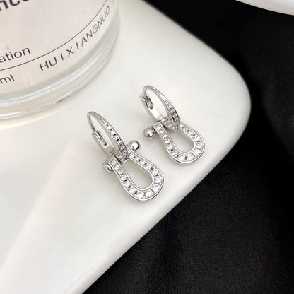 [LUXE] PENDIENTES GOTA FORCE 10 CON DIAMANTES, MODELO MEDIANO