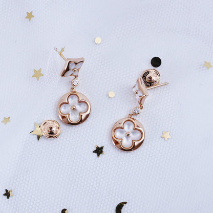 [LUXE] PENDIENTES DE LONGITUD DE MOPA EN ORO ROSA CON ESTRELLA Y SOL