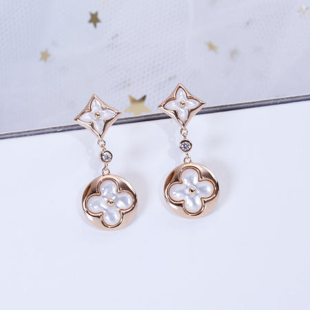 [LUXE] PENDIENTES DE LONGITUD DE MOPA EN ORO ROSA CON ESTRELLA Y SOL