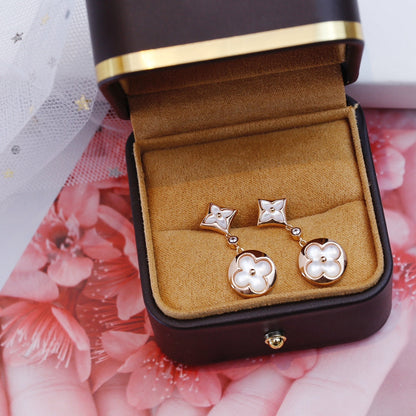[LUXE] PENDIENTES DE LONGITUD DE MOPA EN ORO ROSA CON ESTRELLA Y SOL