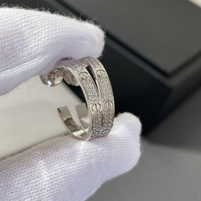 [LUXE] PENDIENTES DE ARO DE PLATA CON DIAMANTES LOVE
