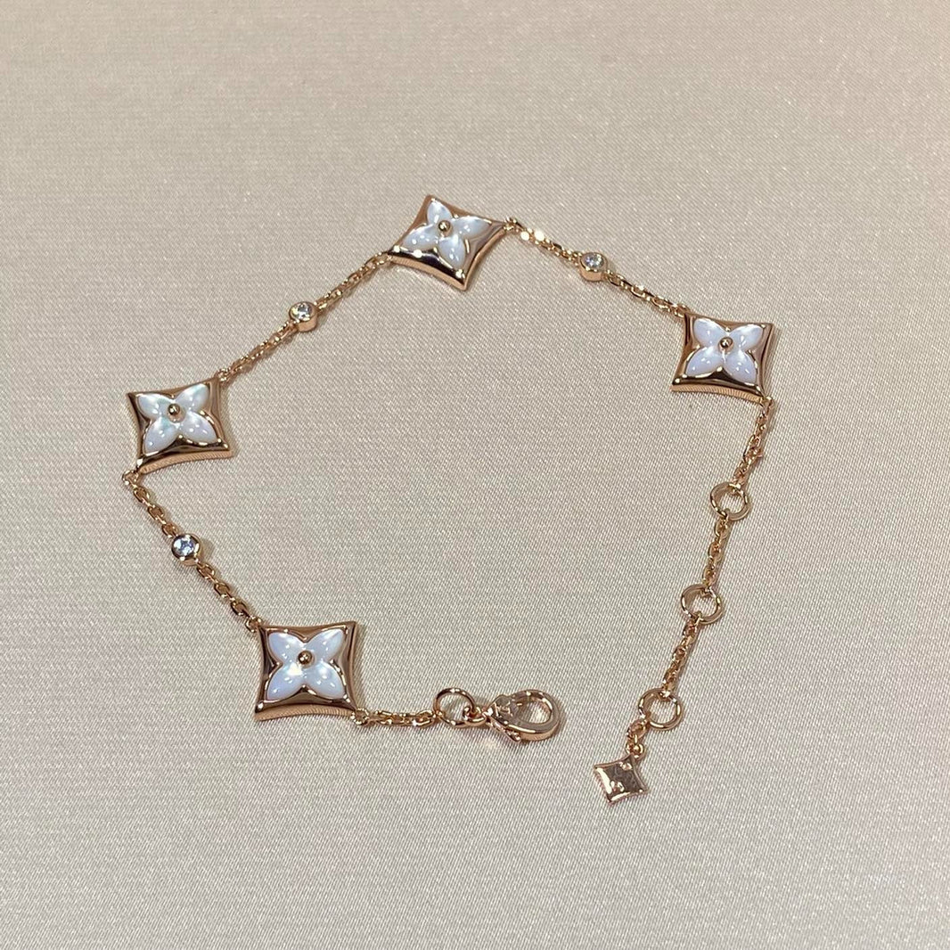 [LUXE] PULSERA DE ORO ROSA CON 4 MOTIVOS DE ESTRELLAS Y DIAMANTE