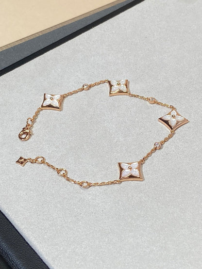 [LUXE] PULSERA DE ORO ROSA CON 4 MOTIVOS DE ESTRELLAS Y DIAMANTE