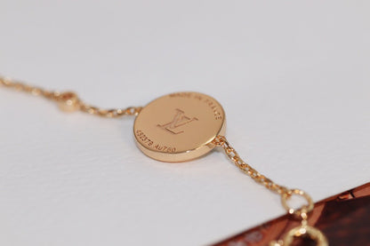 [LUXE] PULSERA DE MALAQUITA EN ORO ROSA CON 4 MOTIVOS DE ESTRELLAS Y SOLES