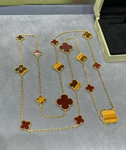 [LUXE] COLLAR DE OJO DE TIGRE CON 16 MOTIVOS DE TRÉBOL Y CORNALINA EN ORO ROSA