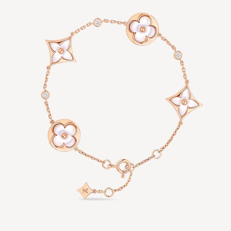 [LUXE] PULSERA DE ORO ROSA CON 4 MOTIVOS DE ESTRELLAS Y SOLES EN BLANCO 