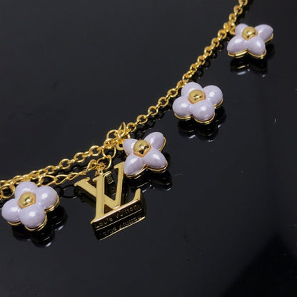 [LUXE]PULSERA DE ORO CON 6 MOTIVOS DE ESTRELLA Y SOL