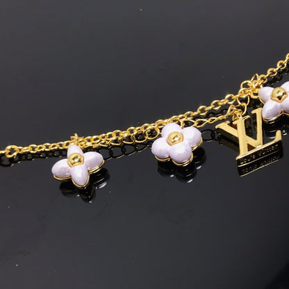 [LUXE]PULSERA DE ORO CON 6 MOTIVOS DE ESTRELLA Y SOL