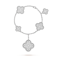 [LUXE] PULSERA DE PLATA Y DIAMANTES CON 6 MOTIVOS DE TRÉBOL