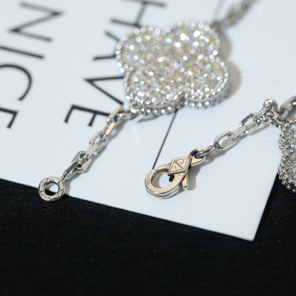[LUXE]PULSERA DE TRÉBOL CON 5 MOTIVOS, PLATA Y DIAMANTES PAVÉ