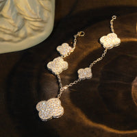 [LUXE]PULSERA DE TRÉBOL CON 5 MOTIVOS, PLATA Y DIAMANTES PAVÉ