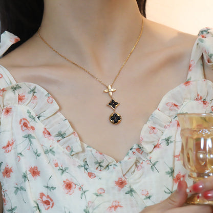 [LUXE] COLLAR DE ORO ROSA CON ÓNIX ESTRELLA Y SOL