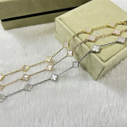 [LUXE]PULSERA DE TRAPEADORA BLANCA CON 6 MOTIVOS DE TRÉBOL