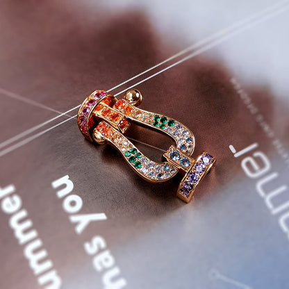 [LUXE]FORCE PULSERA GRANDE DE DIAMANTES DE COLOR HERRADURA EN ORO ROSA