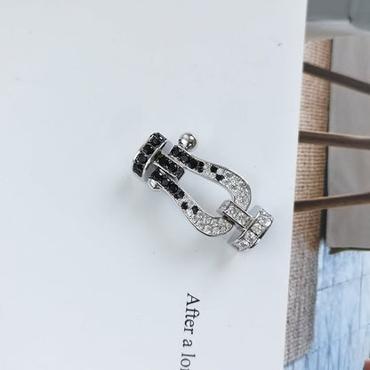 [LUXE]FORCE PULSERA GRANDE DE HERRADURA CON DIAMANTES BLANCOS Y NEGROS EN ORO ROSA