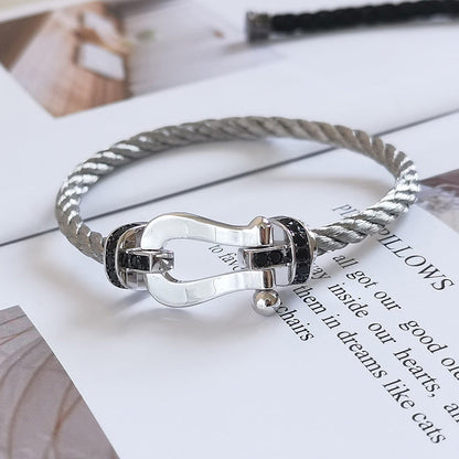 [LUXE]FORCE PULSERA DE HERRADURA GRANDE CON DIAMANTES NEGROS EN PLATA