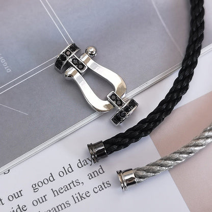 [LUXE]FORCE PULSERA DE HERRADURA GRANDE CON DIAMANTES NEGROS EN PLATA