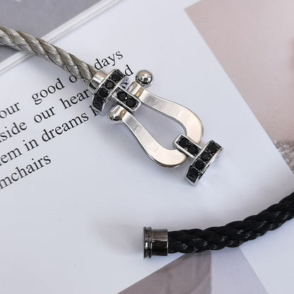 [LUXE]FORCE PULSERA DE HERRADURA GRANDE CON DIAMANTES NEGROS EN PLATA