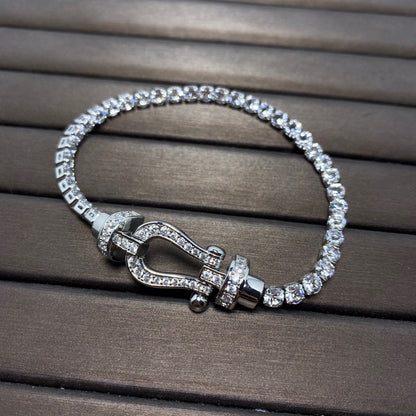 [LUXE]FORCE PULSERA DE TENIS CON DIAMANTES Y HERRADURA GRANDE 
