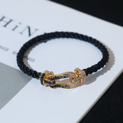[LUXE]FORCE PULSERA GRANDE DE HERRADURA CON DIAMANTES BLANCOS Y NEGROS EN ORO ROSA