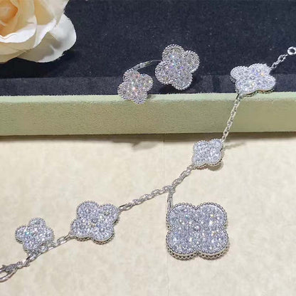[LUXE] PULSERA DE PLATA Y DIAMANTES CON 6 MOTIVOS DE TRÉBOL