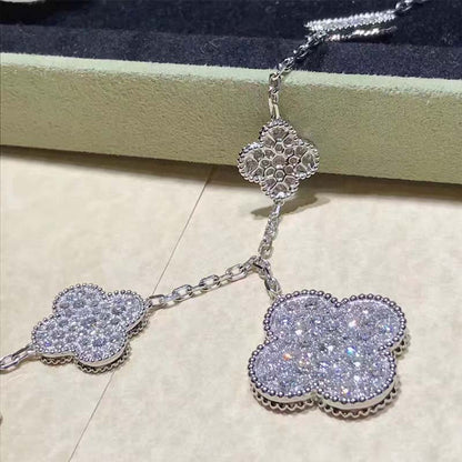 [LUXE] PULSERA DE PLATA Y DIAMANTES CON 6 MOTIVOS DE TRÉBOL