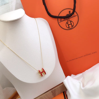 [LUXE] HM CLIC COLLAR DE ORO CON ESMALTE ROJO