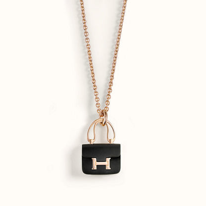 [LUXE] COLLAR CONSTANCE BLACK PEDANT DE ORO ROSA