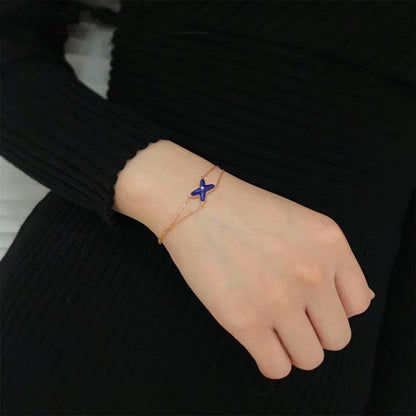 [LUXE]Anillo con diseño hueco de trébol de cuatro hojas en forma de flor