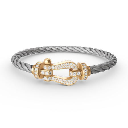 [LUXE]FORCE PULSERA DE ORO CON HERRADURA GRANDE Y DIAMANTES