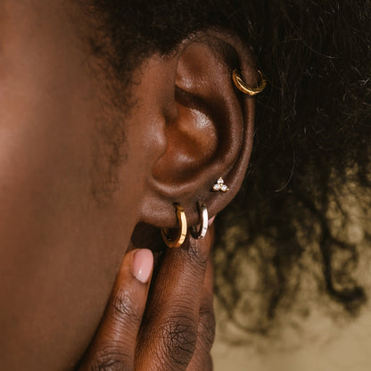 Conjunto de pendientes Huggie del editor