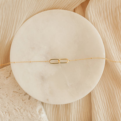 Collar colgante enlazado